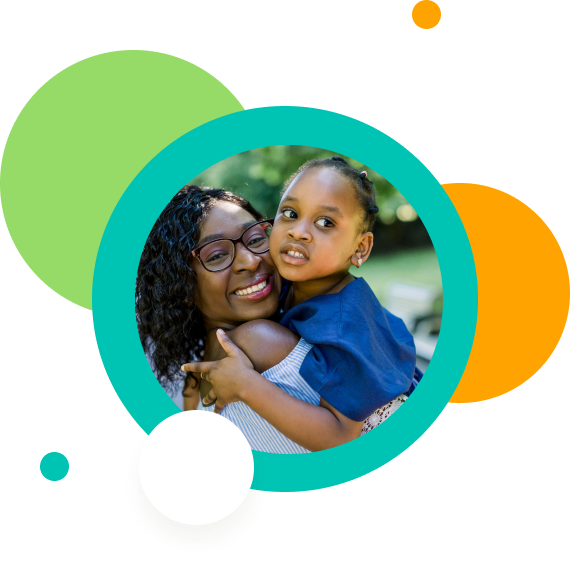 A mother hugging her daughter